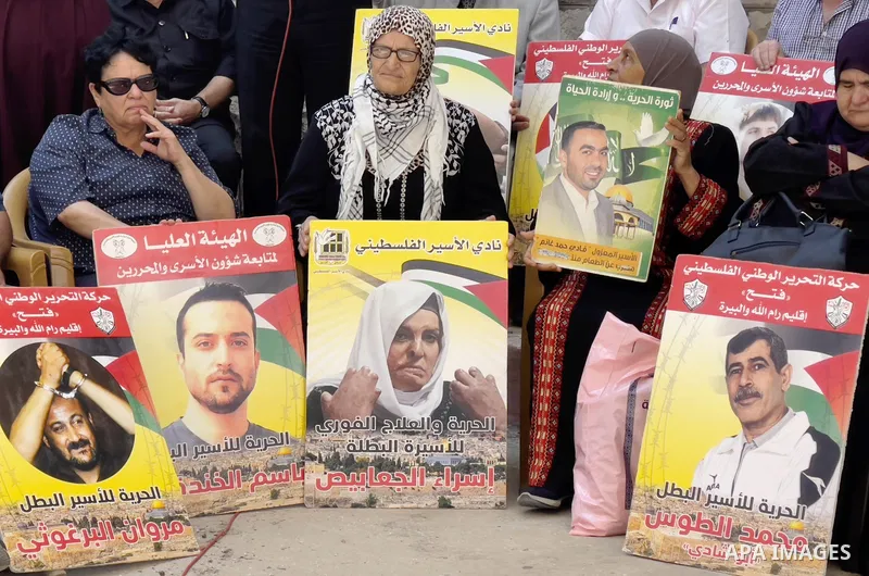 Palestinians take part in a protest to demand the return of the bodies of their slain relatives held by Israeli forces, in front of Red cross office in the West Bank city of Ramallah on August 29, 2023. Israeli authoriti...