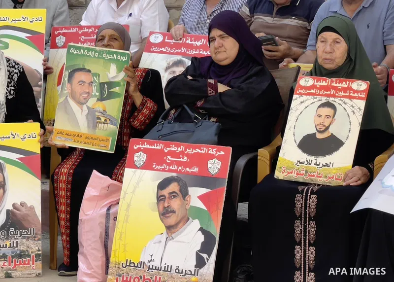 Palestinians take part in a protest to demand the return of the bodies of their slain relatives held by Israeli forces, in front of Red cross office in the West Bank city of Ramallah on August 29, 2023. Israeli authoriti...