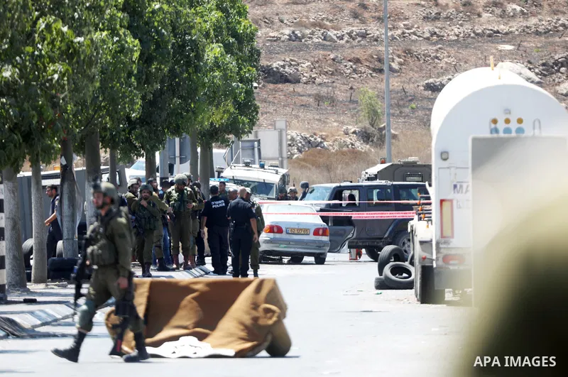 Israeli forces keep guard at the scene of what the Israeli military said is a ramming attack in the West Bank city of Hebron on August 30, 2023. Israeli forces Wednesday shot and injured a Palestinian, south of the West...