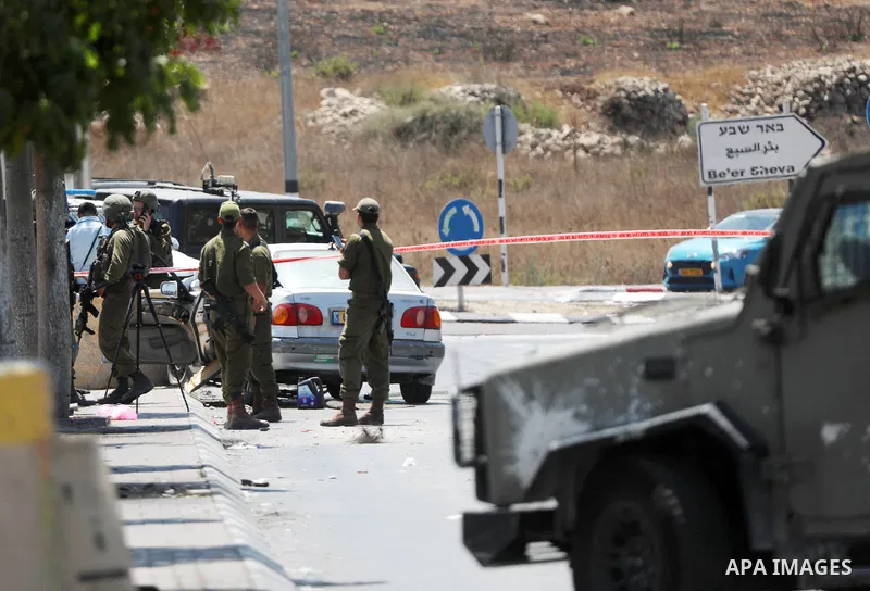 Israeli forces keep guard at the scene of what the Israeli military said is a ramming attack in the West Bank city of Hebron on August 30, 2023. Israeli forces Wednesday shot and injured a Palestinian, south of the West...
