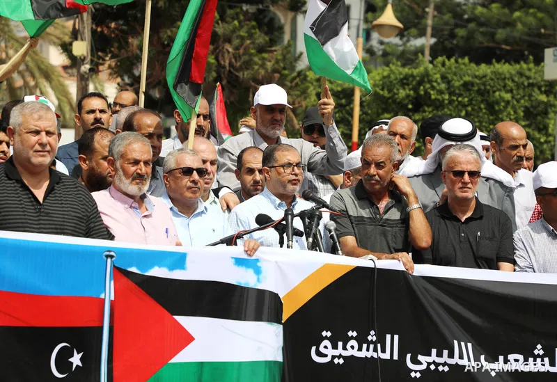 Palestinian factions participate in a rally to thank the Libyan people who against normalization in Gaza city, on August 31, 2023. Palestine thanked Libya on for reiterating its refusal to normalize ties with Israel. Lib...
