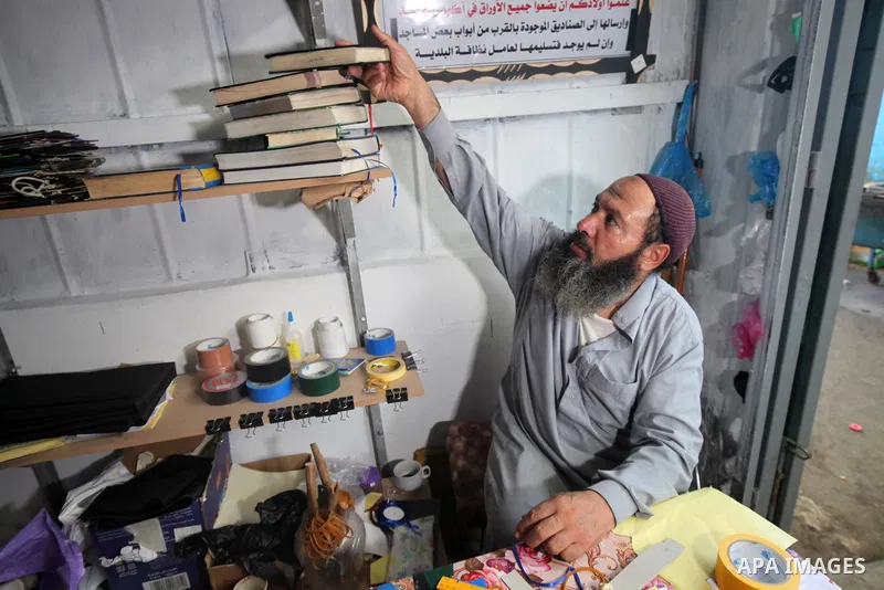 Palestinian men repair and maintain the Holy Qur'an for free in Gaza City on August 31, 2023. Palestinians Raafat Jabr and Rajab Salman, repair and maintain the Holy Qur'an for free at a shop in one of the popular market...