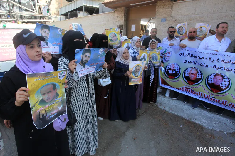 Palestinians take part in a protest in solidarity with prisones held in Israeli Jails in front of Red Cross Office in Gaza city on July 31, 2023. According to the latest figures from Addameer, the Palestinian Prisoner Su...