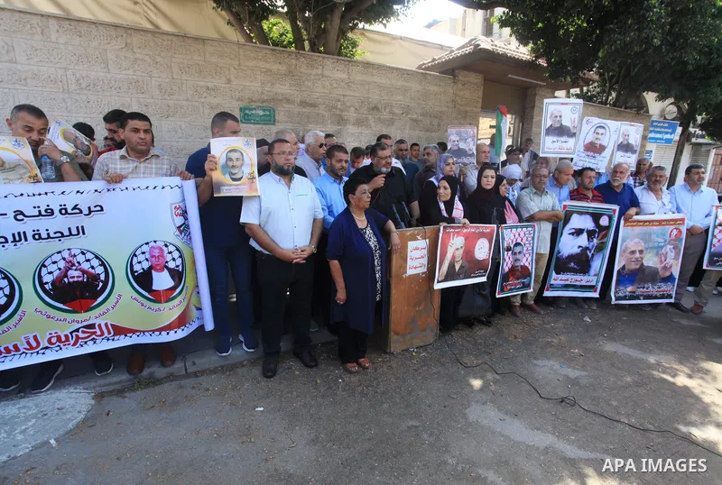 Palestinians take part in a protest in solidarity with prisones held in Israeli Jails in front of Red Cross Office in Gaza city on July 31, 2023. According to the latest figures from Addameer, the Palestinian Prisoner Su...