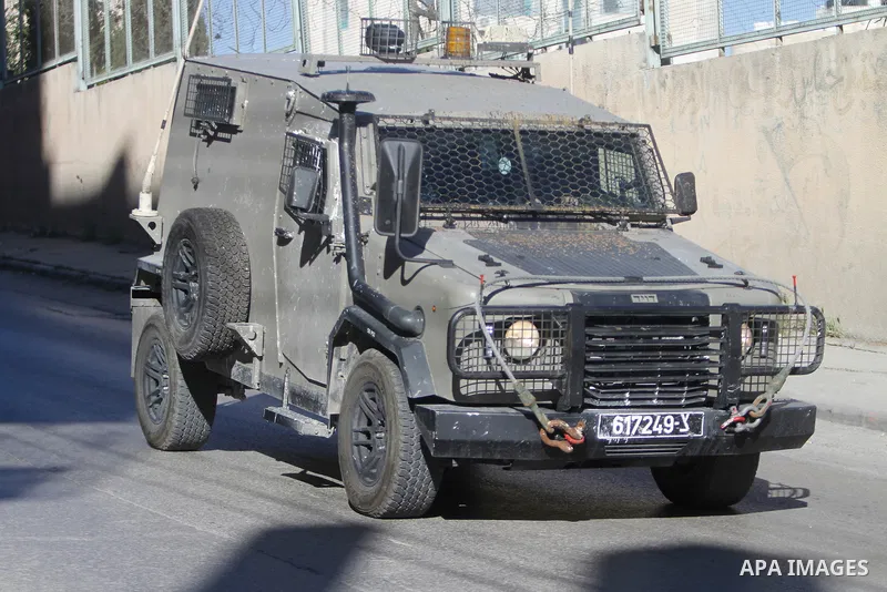 Israeli soldier clash with Palestinians following a raid by Israeli forces in the the West Bank city of Nablus on April 3, 2023. Two Palestinian youths have Monday been killed by Israeli gunfire during a military raid in...