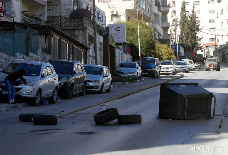 Israeli soldier clash with Palestinians following a raid by Israeli forces in the the West Bank city of Nablus on April 3, 2023. Two Palestinian youths have Monday been killed by Israeli gunfire during a military raid in...