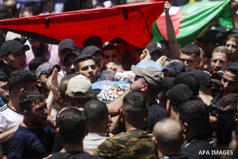 Mourners attend the funeral of Khairi Shaheen and Hamza Maqbul, killed by Israeli forces during a military raid, in Nablus in the occupied West Bank on July 7, 2023. Israeli forces killed two Palestinian militants as a f...