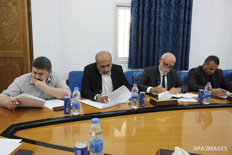 Palestinians attend in a workshop on the Medical Liability Law at the Legislative Council headquarters in Gaza City on July 9, 2023. Photo by Omar Ashtawy\ apaimages