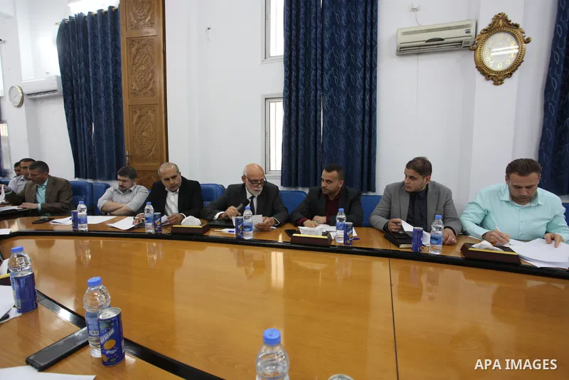 Palestinians attend in a workshop on the Medical Liability Law at the Legislative Council headquarters in Gaza City on July 9, 2023. Photo by Omar Ashtawy\ apaimages