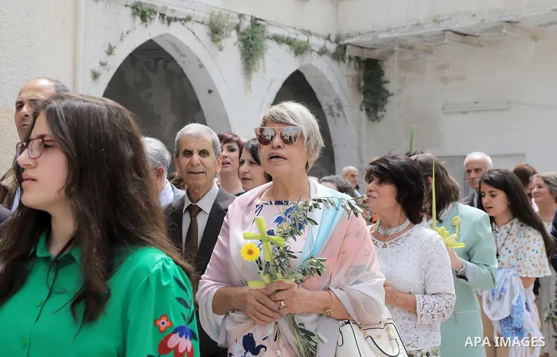 Palestinian Christians attend an Orthodox Palm Sunday, at the Church of Saint Porphyrius in Gaza city on April 09, 2023. Palm Sunday is the commemoration of the Entrance of our Lord into Jerusalem following His glorious...