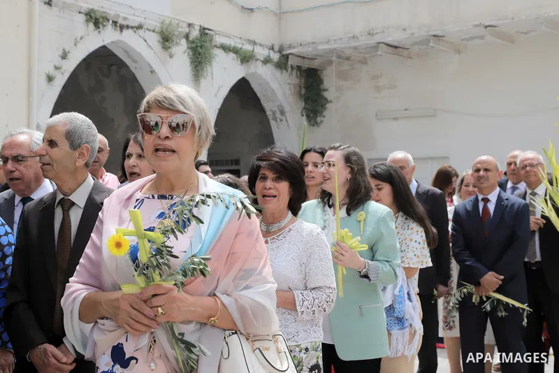 Palestinian Christians attend an Orthodox Palm Sunday, at the Church of Saint Porphyrius in Gaza city on April 09, 2023. Palm Sunday is the commemoration of the Entrance of our Lord into Jerusalem following His glorious...