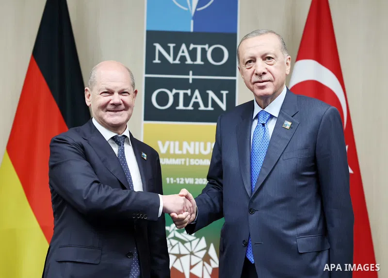Turkish President Recep Tayyip Erdogan meets with German Chancellor Olaf Schultz on the sidelines of the Summit of Heads of State and Government of NATO Member States in the Lithuanian capital, Vilnius on July 11, 2023....