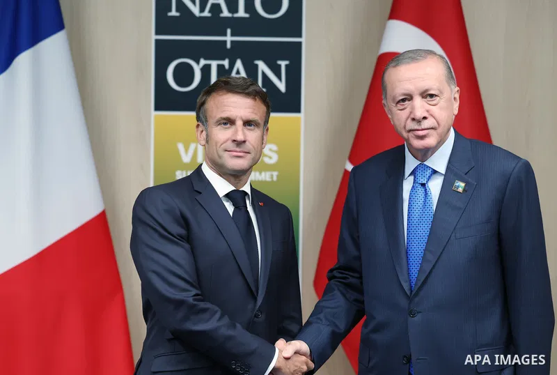 Turkish President Recep Tayyip Erdogan meets French President Emmanuel Macron on the sidelines of the Summit of Heads of State and Government of the North Atlantic Treaty Organization (NATO) in the Lithuanian capital, Vi...
