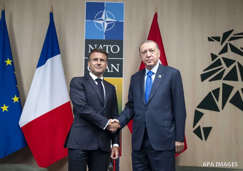 Turkish President Recep Tayyip Erdogan meets French President Emmanuel Macron on the sidelines of the Summit of Heads of State and Government of the North Atlantic Treaty Organization (NATO) in the Lithuanian capital, Vi...