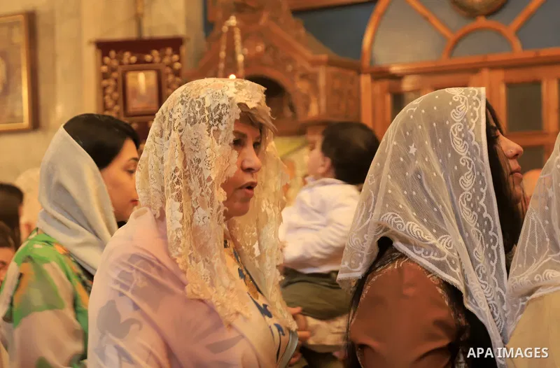 Palestinian Christians attend an Orthodox Palm Sunday, at the Church of Saint Porphyrius in Gaza city on April 09, 2023. Palm Sunday is the commemoration of the Entrance of our Lord into Jerusalem following His glorious...
