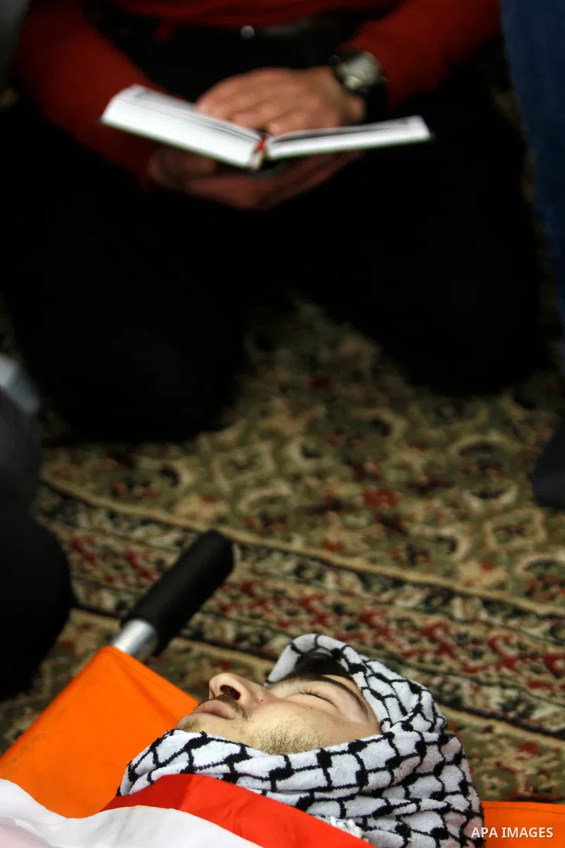 Palestinian mourners attend the funeral of Ayed Slim in his village of Azzun in the West Bank, on April 9, 2023. Israeli soldiers shot dead a Palestinian man in the north of the West Bank on April 8, the Palestinian heal...