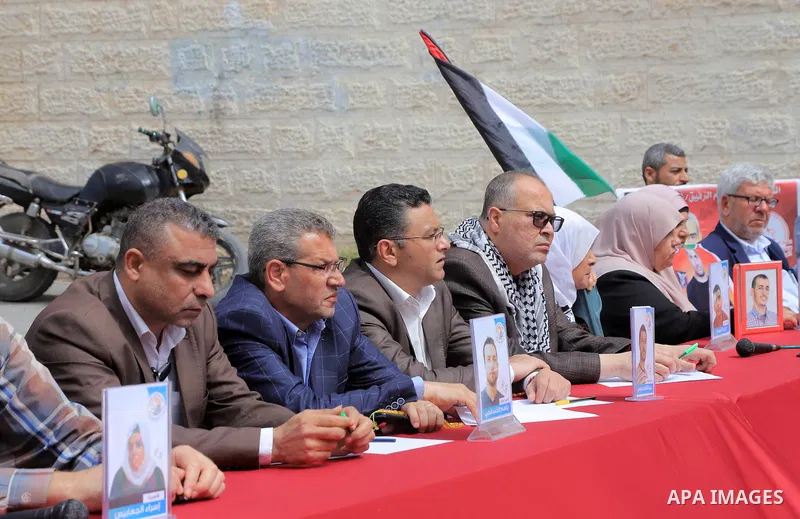 Palestinians take part take part in a protest to solidarity with prisoners held in Israeli jails, in front of Red cross office in Gaza city on April 10, 2023. More than 4,780 prisoners are currently incarcerated in Israe...