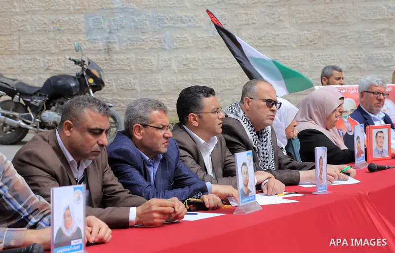 Palestinians take part take part in a protest to solidarity with prisoners held in Israeli jails, in front of Red cross office in Gaza city on April 10, 2023. More than 4,780 prisoners are currently incarcerated in Israe...