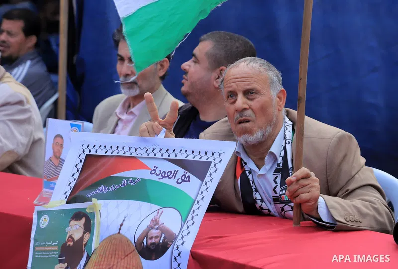 Palestinians take part take part in a protest to solidarity with prisoners held in Israeli jails, in front of Red cross office in Gaza city on April 10, 2023. More than 4,780 prisoners are currently incarcerated in Israe...