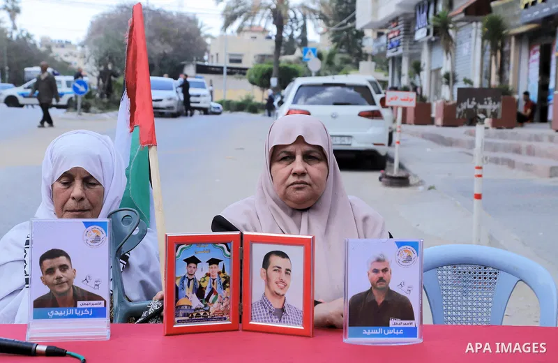 Palestinians take part take part in a protest to solidarity with prisoners held in Israeli jails, in front of Red cross office in Gaza city on April 10, 2023. More than 4,780 prisoners are currently incarcerated in Israe...
