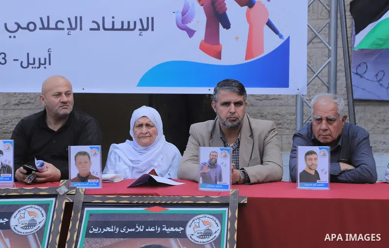 Palestinians take part take part in a protest to solidarity with prisoners held in Israeli jails, in front of Red cross office in Gaza city on April 10, 2023. More than 4,780 prisoners are currently incarcerated in Israe...