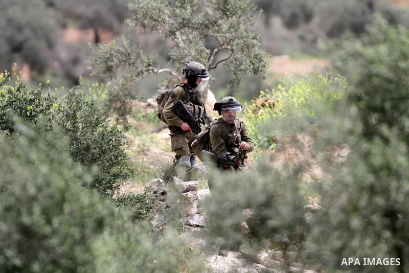 Clashes between Palestinian protesters and Israeli soldiers during a protest in the village of Beita, south of Nablus in the occupied West Bank, on April 10, 2023, against a march by settlers to the nearby Israeli outpos...