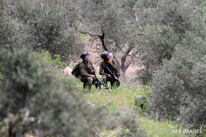 Clashes between Palestinian protesters and Israeli soldiers during a protest in the village of Beita, south of Nablus in the occupied West Bank, on April 10, 2023, against a march by settlers to the nearby Israeli outpos...