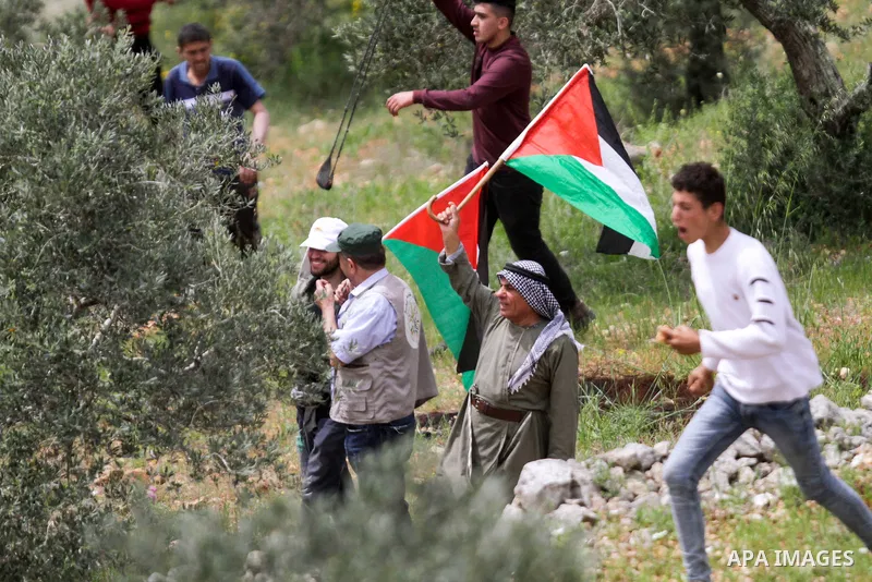 Clashes between Palestinian protesters and Israeli soldiers during a protest in the village of Beita, south of Nablus in the occupied West Bank, on April 10, 2023, against a march by settlers to the nearby Israeli outpos...