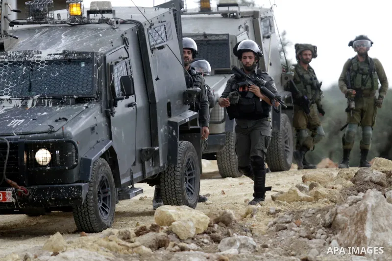 Clashes between Palestinian protesters and Israeli soldiers during a protest in the village of Beita, south of Nablus in the occupied West Bank, on April 10, 2023, against a march by settlers to the nearby Israeli outpos...