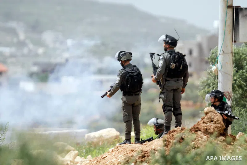 Clashes between Palestinian protesters and Israeli soldiers during a protest in the village of Beita, south of Nablus in the occupied West Bank, on April 10, 2023, against a march by settlers to the nearby Israeli outpos...
