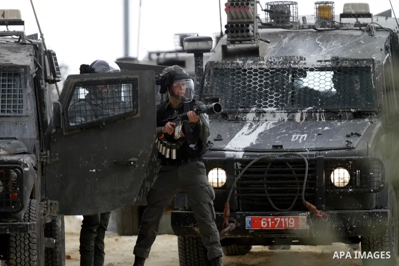 Clashes between Palestinian protesters and Israeli soldiers during a protest in the village of Beita, south of Nablus in the occupied West Bank, on April 10, 2023, against a march by settlers to the nearby Israeli outpos...