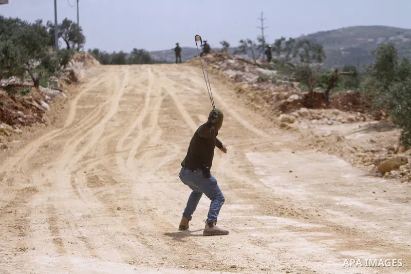 Clashes between Palestinian protesters and Israeli soldiers during a protest in the village of Beita, south of Nablus in the occupied West Bank, on April 10, 2023, against a march by settlers to the nearby Israeli outpos...
