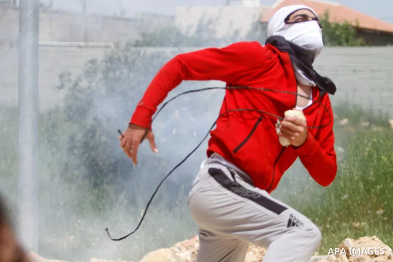Clashes between Palestinian protesters and Israeli soldiers during a protest in the village of Beita, south of Nablus in the occupied West Bank, on April 10, 2023, against a march by settlers to the nearby Israeli outpos...