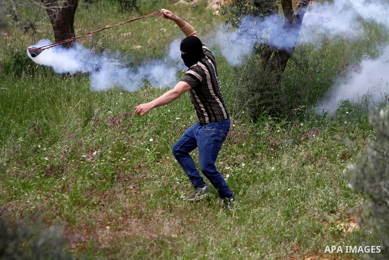 Clashes between Palestinian protesters and Israeli soldiers during a protest in the village of Beita, south of Nablus in the occupied West Bank, on April 10, 2023, against a march by settlers to the nearby Israeli outpos...
