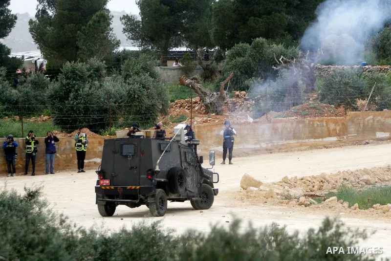 Clashes between Palestinian protesters and Israeli soldiers during a protest in the village of Beita, south of Nablus in the occupied West Bank, on April 10, 2023, against a march by settlers to the nearby Israeli outpos...