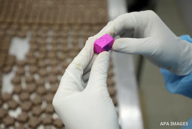 Palestinian workers prepare chocolate for the Eid al-Fitr festival at a chocolate factory in Gaza city on April 12, 2023. Eid al-Fitr is the ended of the holy month of Ramadan by praying during the night time and fasting...