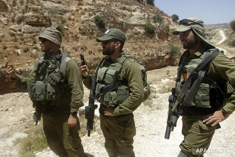 Palestinians take part in a protest following Friday prayer against settlement in the town of Deir Istiya, in the West Bank city of Salfit, on July 14, 2023. Israeli forces denied today access of Palestinian landlords in...