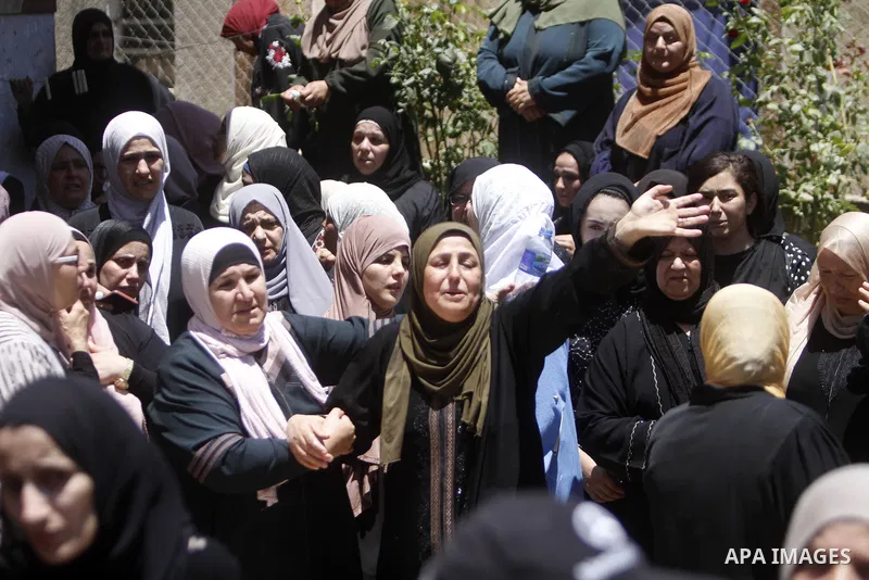 Mourners carry the body of Palestinian Fawzi Makhalfeh, 18, who was killed by Israeli soldiers during his funeral in the town of Sebastia near Nablus in the West Bank on July 22, 2023. The Israeli soldiers shooting and k...