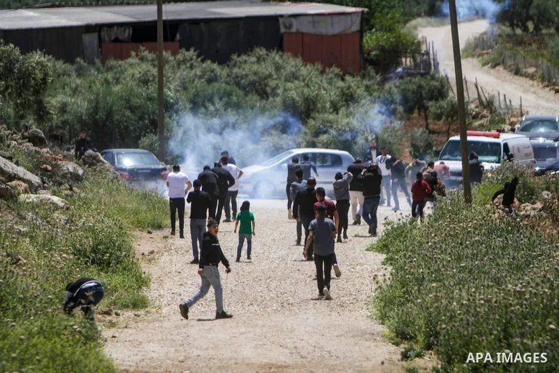 Clashes between Palestinian protesters and Israeli soldiers following a protest against the expansion of Jewish settlements, on April 28, 2023, in the West Bank village of Beit Dajan, east of Nablus. Photo by Mohammed Na...