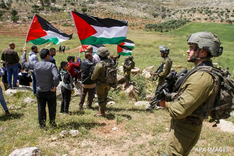 Clashes between Palestinian protesters and Israeli soldiers following a protest against the expansion of Jewish settlements, on April 28, 2023, in the West Bank village of Beit Dajan, east of Nablus. Photo by Mohammed Na...