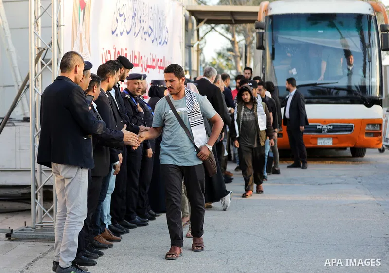 April 28, 2023, Gaza, Palestine: Palestinians who were evacuated from the country of Sudan due to the fighting, arrive in the Gaza Strip through the Rafah border crossing with Egypt. (Credit Image: Yousef Masoud/SOPA Ima...