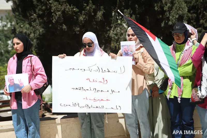 Palestinian students take part in a protest following the announcement of the death of a Palestinian hunger striker Khader Adnan who was in Israeli Jails in the West Bank city of Hebron on May 3, 2023. Palestinian prison...