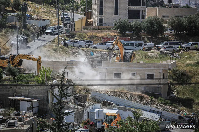 May 10, 2023, Jerusalem, Israel: Israeli bulldozers demolition residential houses in Jabal Mukaber neighborhood in East Jerusalem. Heavy machinery belonging to the municipality demolished two houses in the ''Khilat al-Ab...