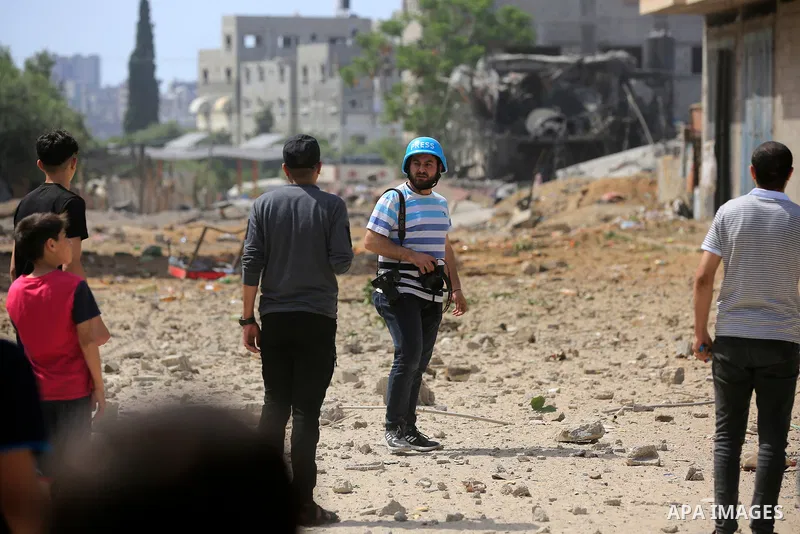 Palestinians inspect a house which was destroyed following an Israeli air strike in Beit Lahia in the northern Gaza Strip on May 12, 2023. Israel and Gaza militants traded heavy fire on May 12, as hopes faded of securing...
