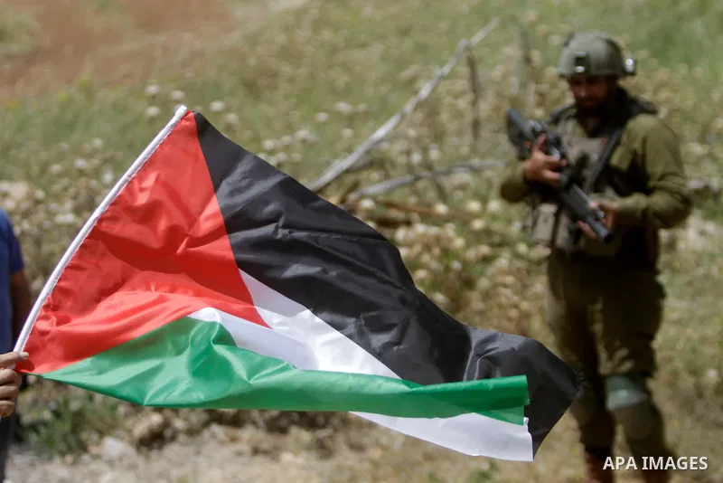 Clashes between Palestinian protesters and Israeli soldiers following a protest against the expansion of Jewish settlements, on May 12, 2023, in the West Bank village of Beit Dajan, east of Nablus. Photo by Mohammed Nass...