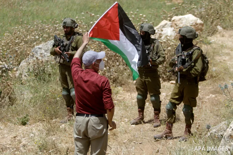 Clashes between Palestinian protesters and Israeli soldiers following a protest against the expansion of Jewish settlements, on May 12, 2023, in the West Bank village of Beit Dajan, east of Nablus. Photo by Mohammed Nass...