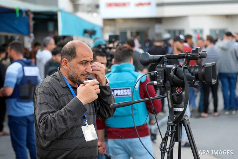 Palestinian journalists cover the conflict between Islamic Jihad movement and Israel in Gaza city on May 2023. Calm returned to Gaza as a fragile ceasefire ending five days of fighting held, leaving Palestinians and Isra...