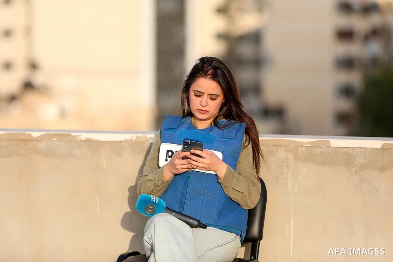 Palestinian journalists cover the conflict between Islamic Jihad movement and Israel in Gaza city on May 2023. Calm returned to Gaza as a fragile ceasefire ending five days of fighting held, leaving Palestinians and Isra...