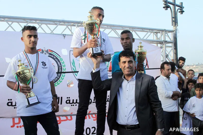 Palestinians take part in a marathon mark the 75th anniversary of Nakba, or the "catastrophe" in Gaza city on May 23, 2023. "Nakba," which is the Arabic word for "catastrophe," refers to Palestinian's expulsion from and...