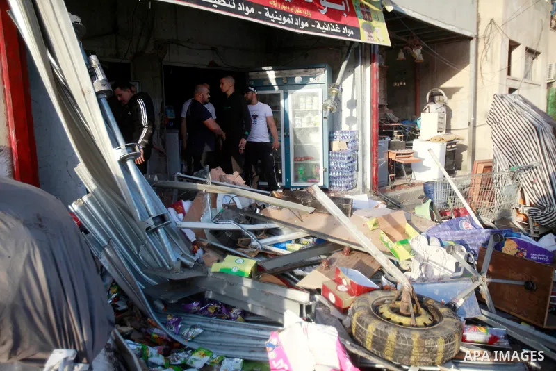 Palestinians inspect the damage during an Israeli army raid in the refugee camp of Nur Shams, east of the West Bank city of Tulkarm on May 30, 2023. Israeli forces raided the camp and broke into the family house of the s...
